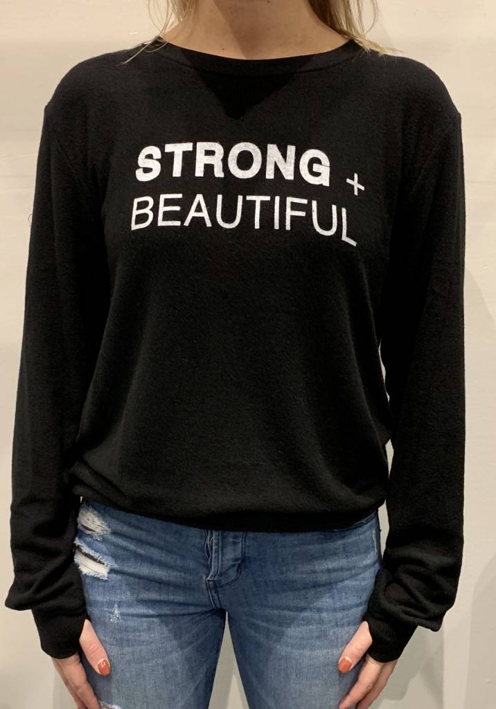 I Am More Scarsdale's Strong + Beautiful black sweatshirt on body close up