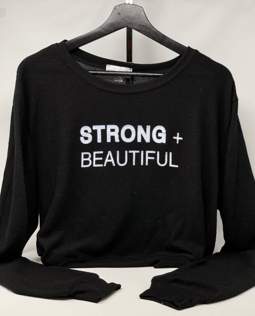 I Am More Scarsdale's Strong + Beautiful black sweatshirt on hanger front view
