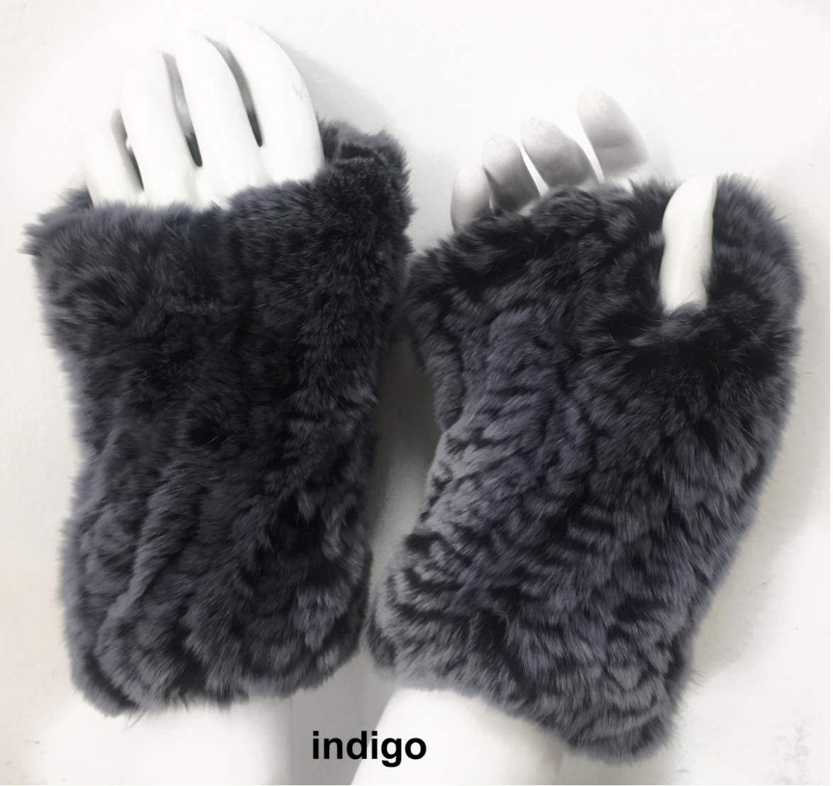 linda richards indigo fur hand warmers on mannequin