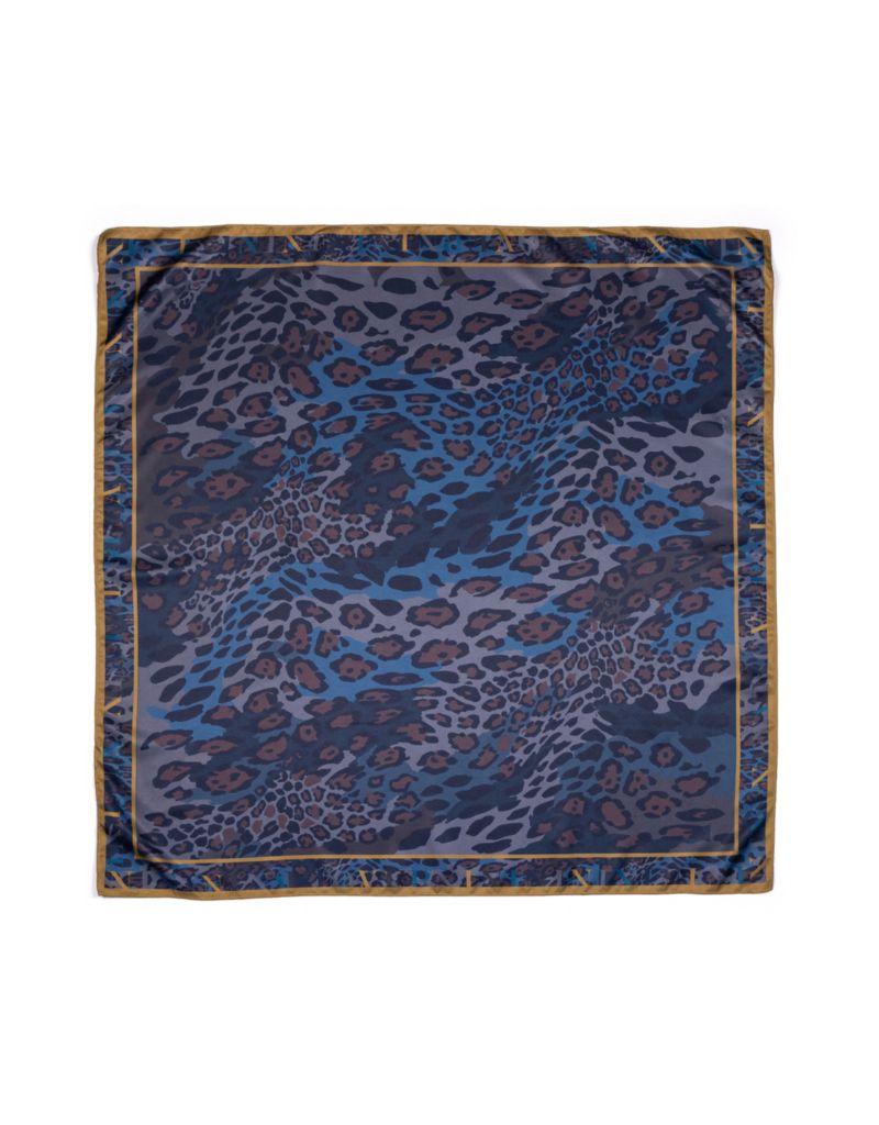 Navy blue scarf with leopard print on a white background